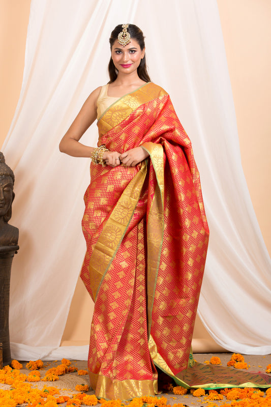 Pink Kanjivaram saree with Gold zari Border