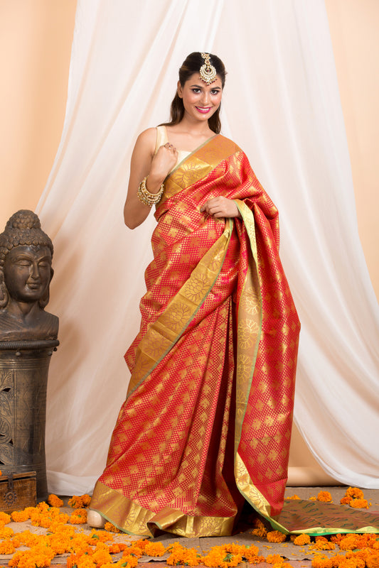 Pink Kanjivaram saree with Gold zari Border