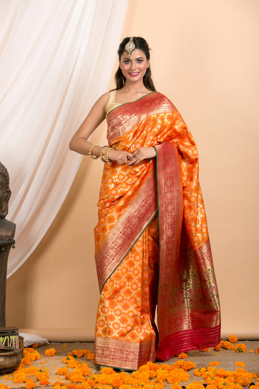 Orange Banarasi Patola pattern saree with Red Border