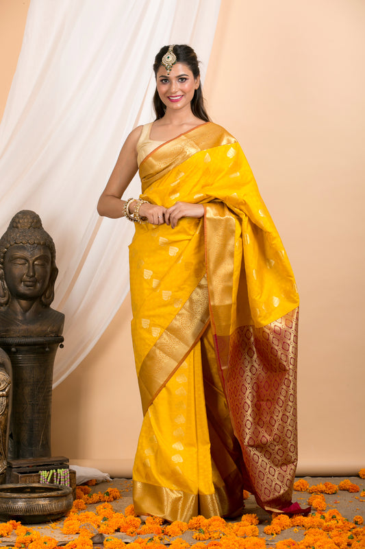 Mustard Kanjivaram saree with Gold Floral zari Border and red palla