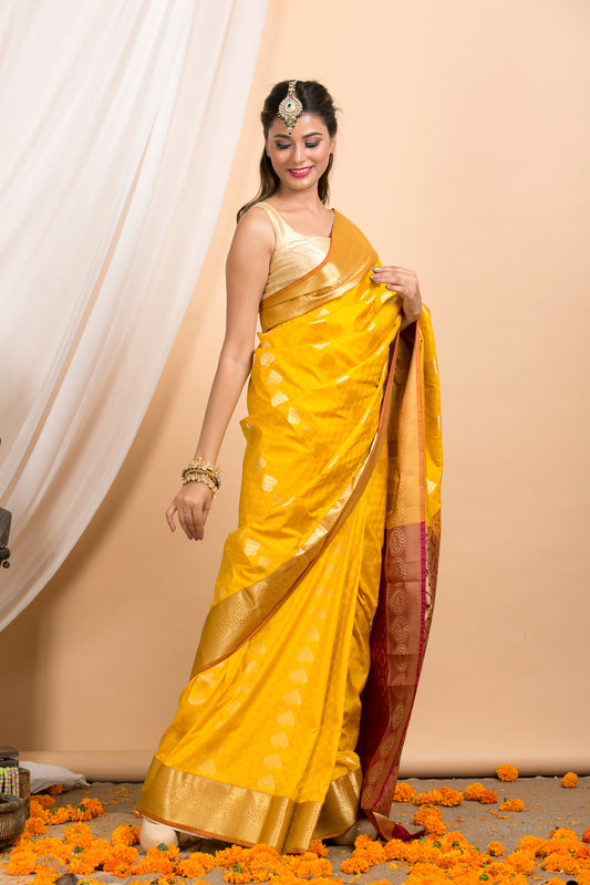 Mustard Kanjivaram saree with Gold Floral zari Border and red palla