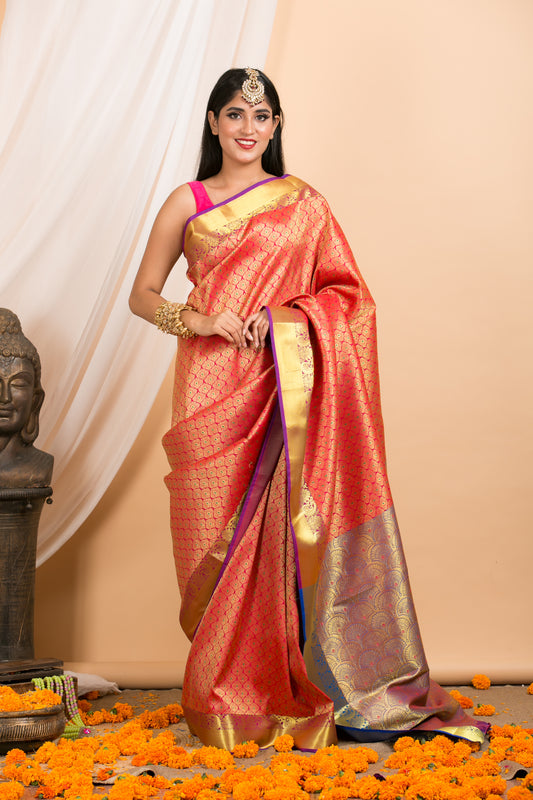 Pink Kanjivaram saree with Purple Border